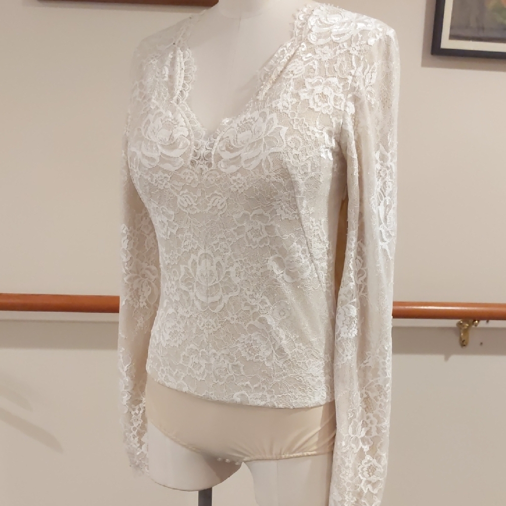 NWOT! Never Worn.Lace Long Sleeve V-Neck Bodysuit in Ivory